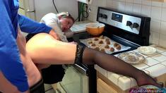 The maid takes the hard cock in the kitchen