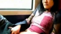 Asian girl fingers herself on public train