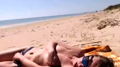 Girl masturbating by the sea